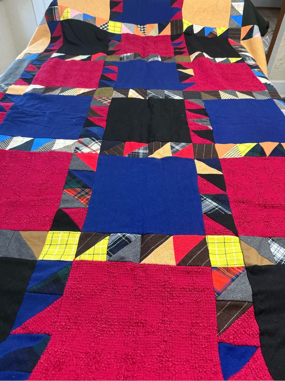 Colorblock Patchwork Throw Quilt in Red, Blue, Black.